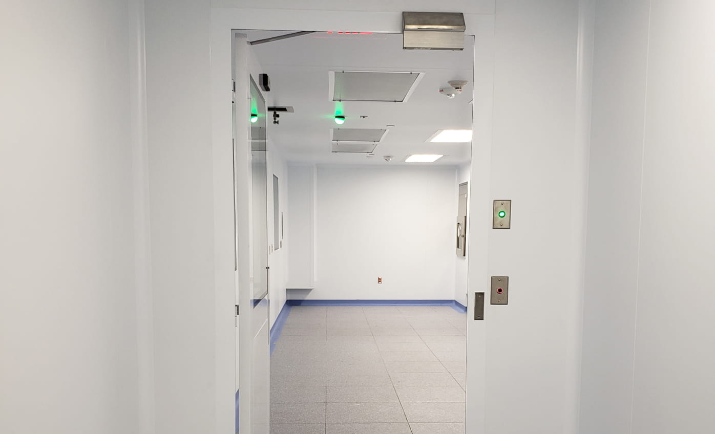 Inside of a POD cleanroom photographed through a doorway